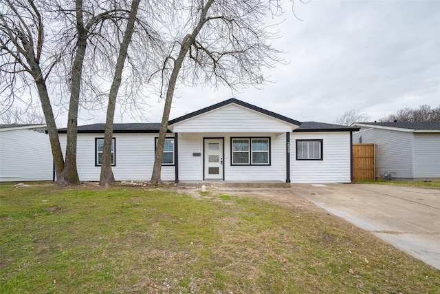 ranch-style house with a front yard