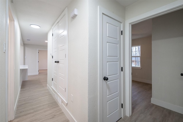 hall featuring light hardwood / wood-style flooring