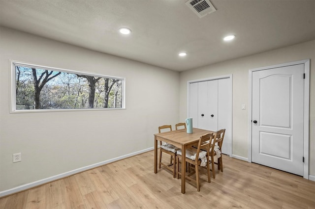 dining room featuring light wood-type flooring