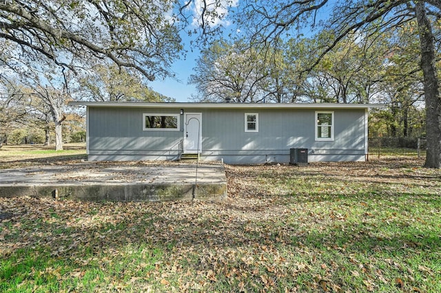 view of front of home featuring central AC unit