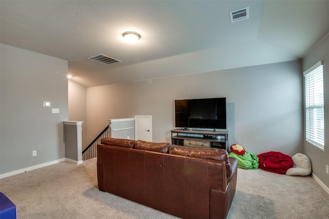 living room featuring light colored carpet