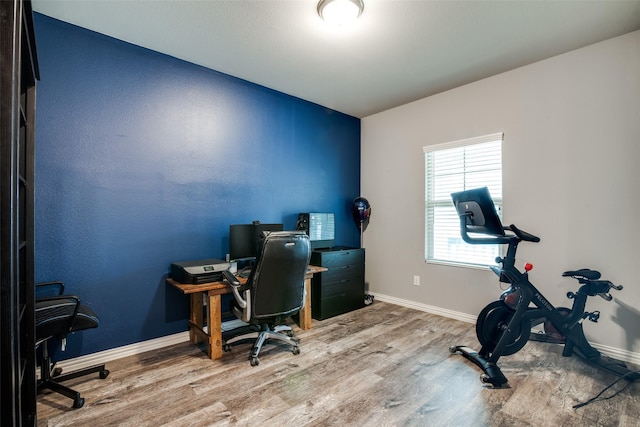 home office featuring hardwood / wood-style flooring