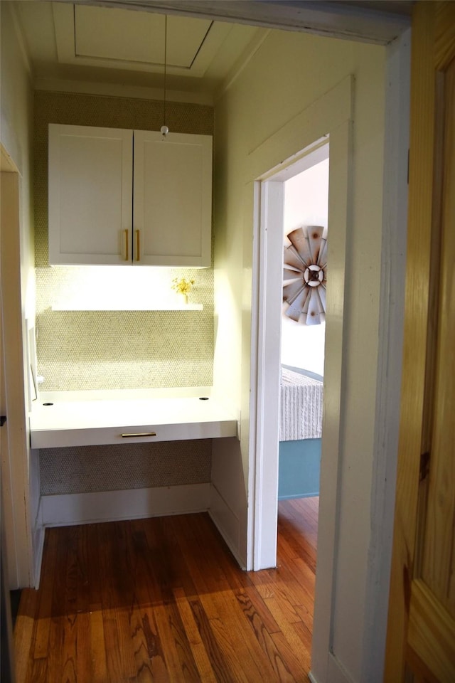 corridor featuring hardwood / wood-style floors