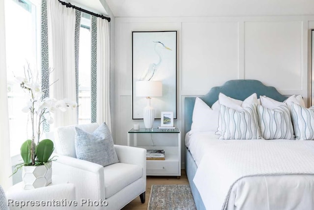 bedroom featuring wood-type flooring