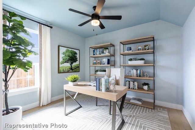 office space with hardwood / wood-style flooring, vaulted ceiling, and ceiling fan