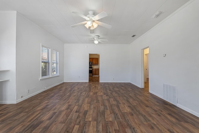 unfurnished room with dark wood-type flooring and ceiling fan