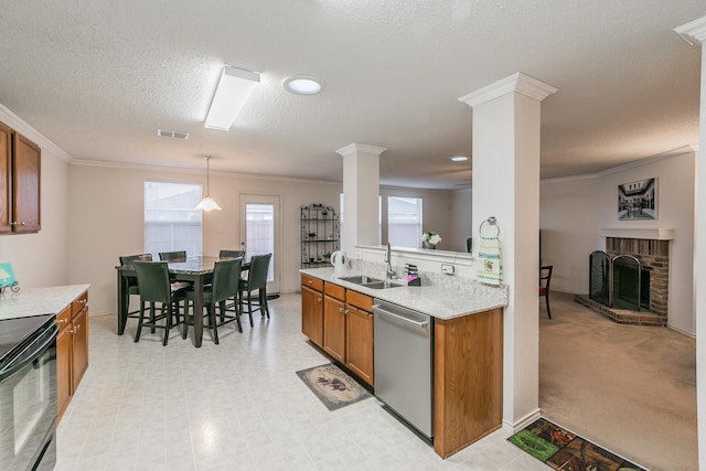 kitchen with black electric range oven, sink, ornamental molding, dishwasher, and pendant lighting