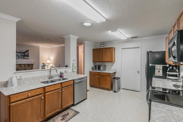 kitchen with sink, crown molding, black appliances, and a textured ceiling