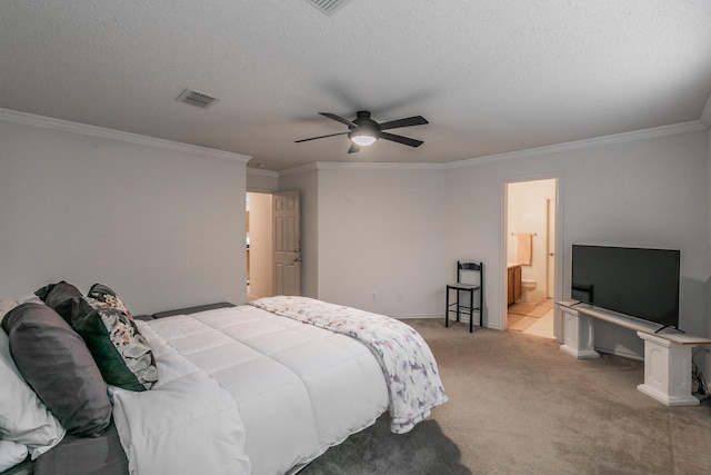 bedroom featuring crown molding, ensuite bath, light carpet, a textured ceiling, and ceiling fan