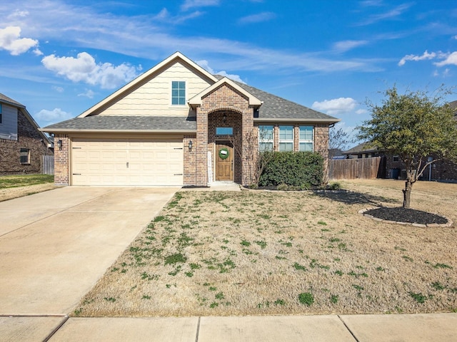 view of front of home with a garage