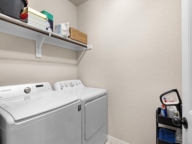 washroom featuring independent washer and dryer