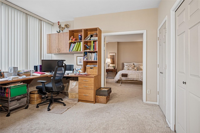 view of carpeted home office