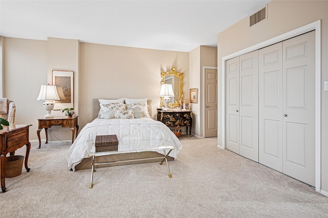 carpeted bedroom with a closet