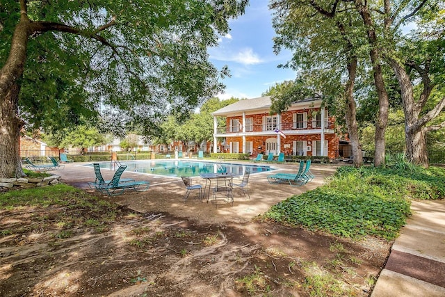 view of pool featuring a patio area