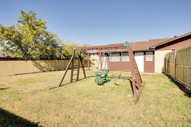 view of playground featuring a lawn