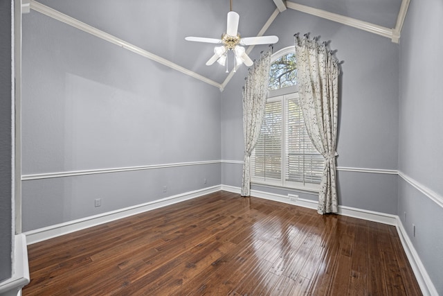 spare room featuring lofted ceiling, hardwood / wood-style floors, ornamental molding, and ceiling fan