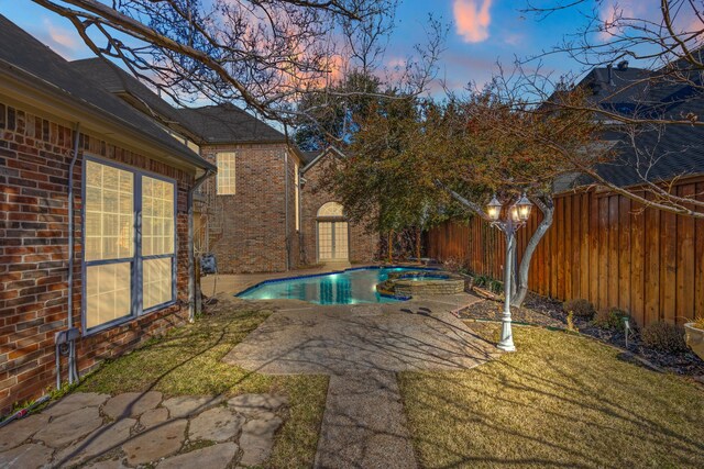 5008 Bellerive Dr, Dallas, TX 75287 - view of swimming pool with a fenced backyard, a patio area, and a pool with connected hot tub