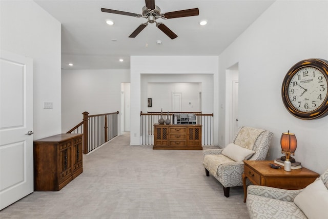 sitting room with light colored carpet