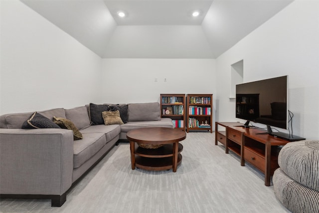 living room featuring vaulted ceiling and light colored carpet