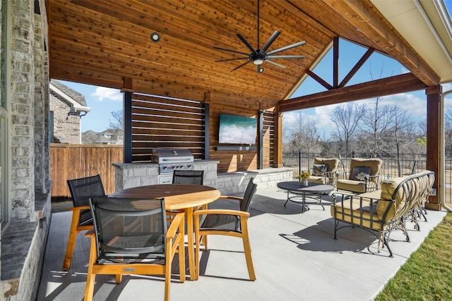 view of patio / terrace featuring a gazebo, area for grilling, and ceiling fan