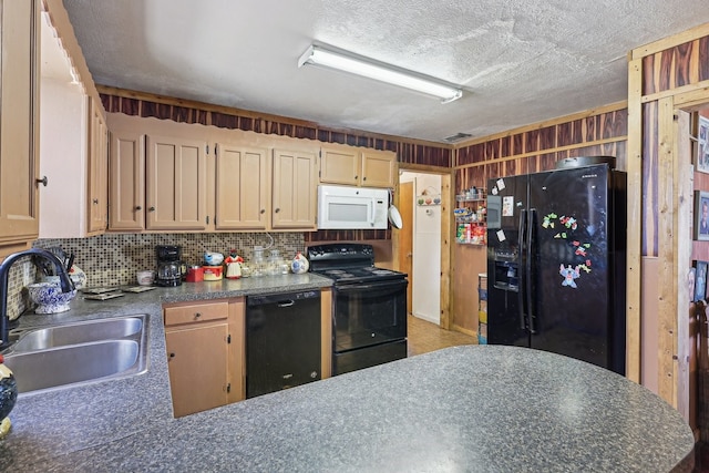 kitchen featuring sink, backsplash, wooden walls, black appliances, and a textured ceiling