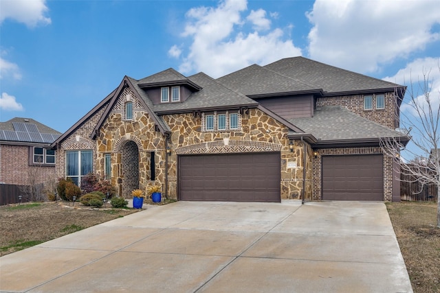 view of front of home with a garage