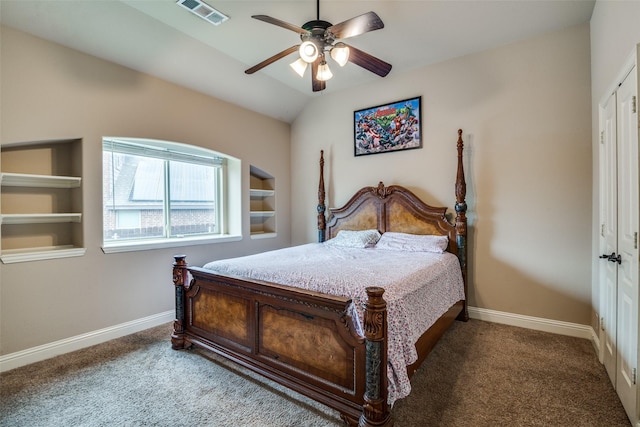 carpeted bedroom with lofted ceiling, ceiling fan, and a closet