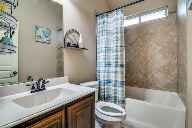 full bathroom featuring vanity, shower / bath combination with curtain, and toilet