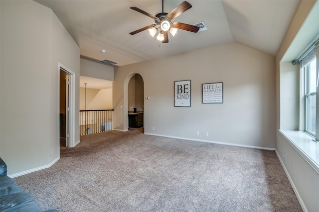 interior space featuring vaulted ceiling and ceiling fan