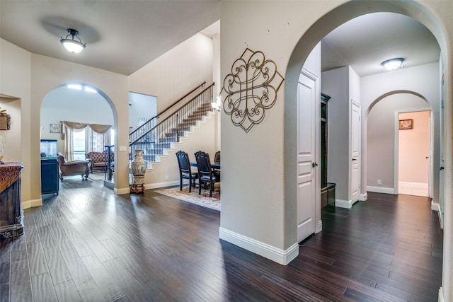 hall featuring dark wood-type flooring