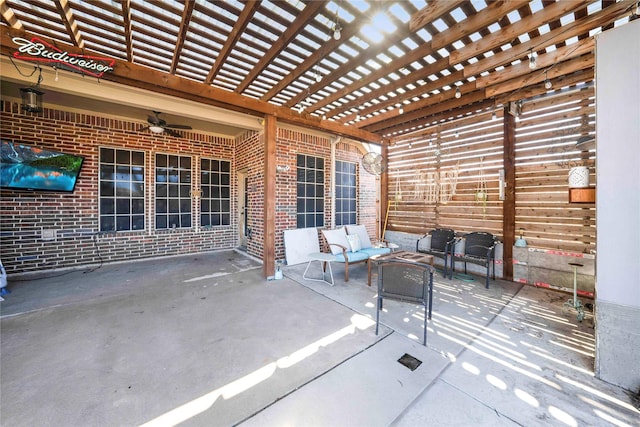 view of patio featuring an outdoor living space and a pergola