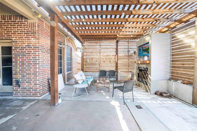 view of patio featuring a pergola