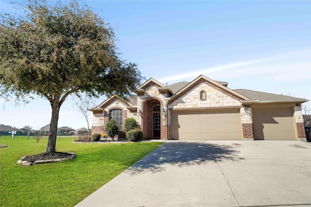 view of front of house featuring a garage and a front yard