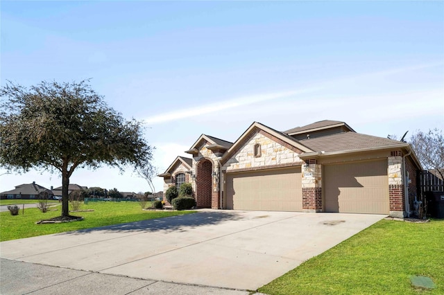 view of front of property with a garage and a front yard