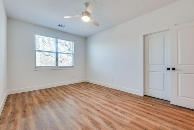 2130 Roanoke Ave, Dallas, TX 75235 - unfurnished bedroom with ceiling fan and light wood-type flooring