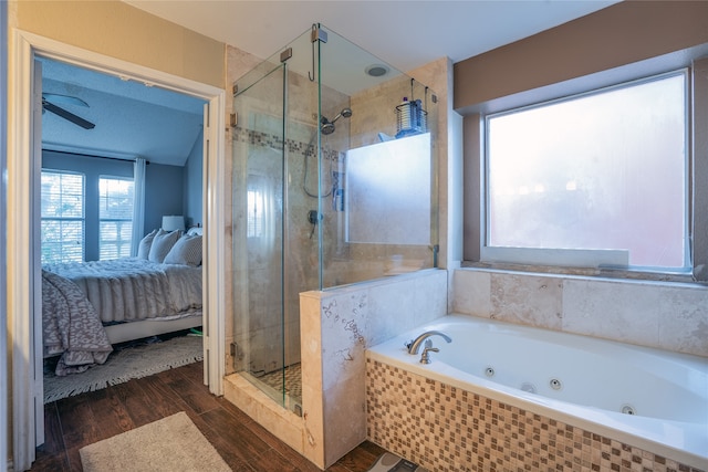 bathroom featuring wood-type flooring and plus walk in shower