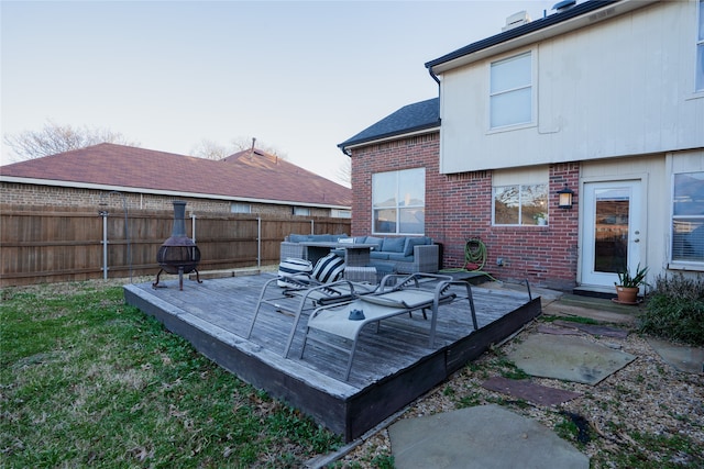 wooden terrace featuring an outdoor hangout area