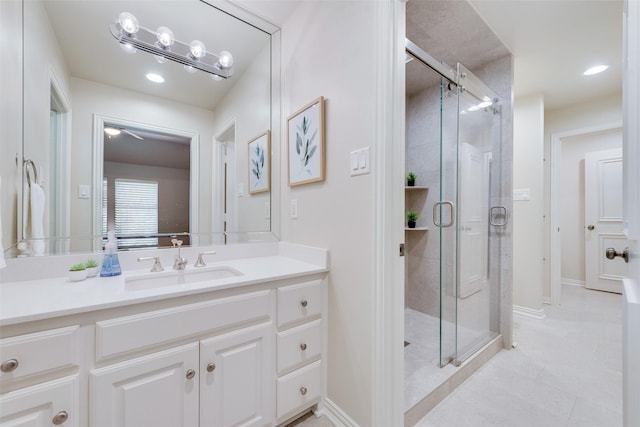 bathroom with vanity and an enclosed shower