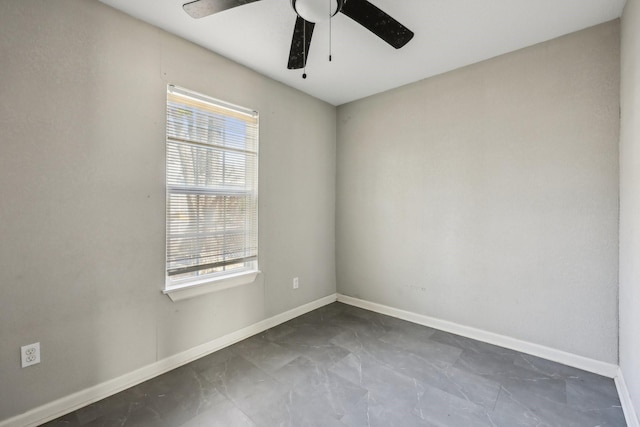 empty room featuring ceiling fan