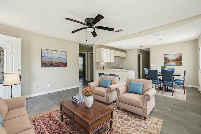 living room featuring ceiling fan