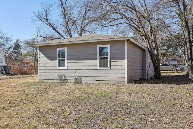 view of home's exterior featuring a yard