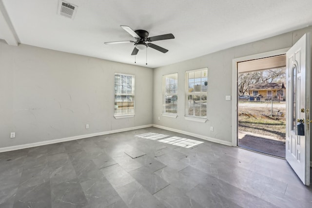 spare room featuring ceiling fan