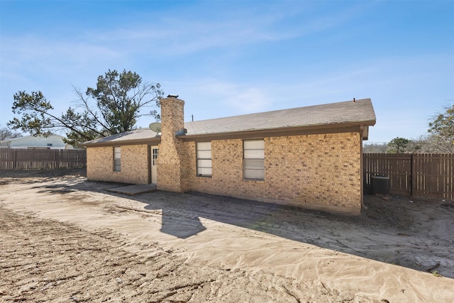 back of property featuring a patio area