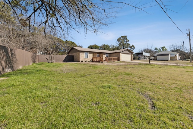 view of yard featuring a garage