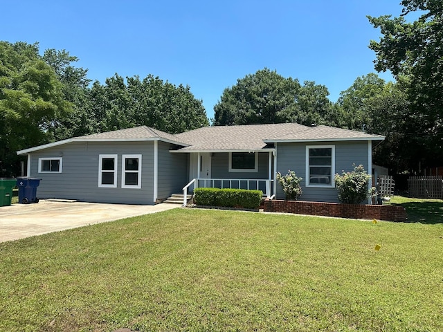 ranch-style home with a front lawn and covered porch