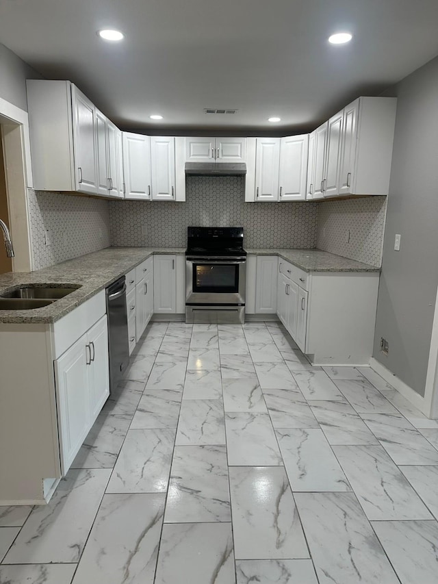 kitchen with white cabinetry, sink, dishwashing machine, and electric stove