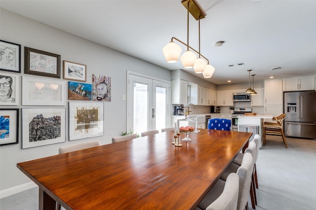 dining room featuring french doors