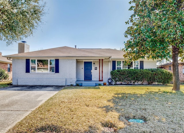 ranch-style house with a front yard