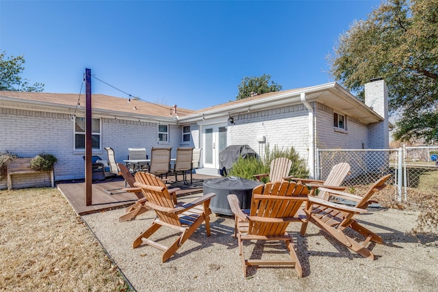 rear view of house featuring a patio and french doors