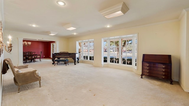 living area with light carpet, crown molding, and a chandelier